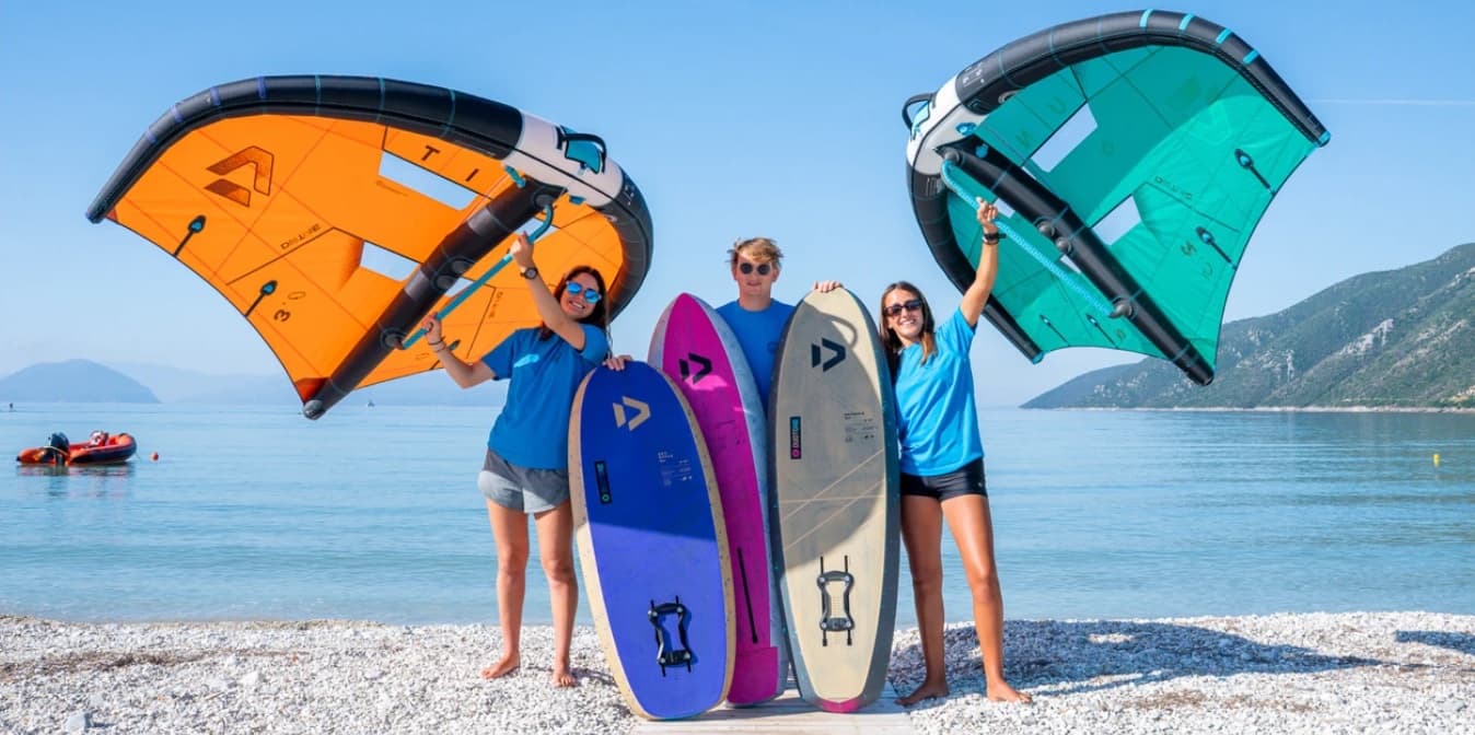 Toby and the Club Vass Flight Squad with their Duotone wings and boards on the beach at Vassiliki